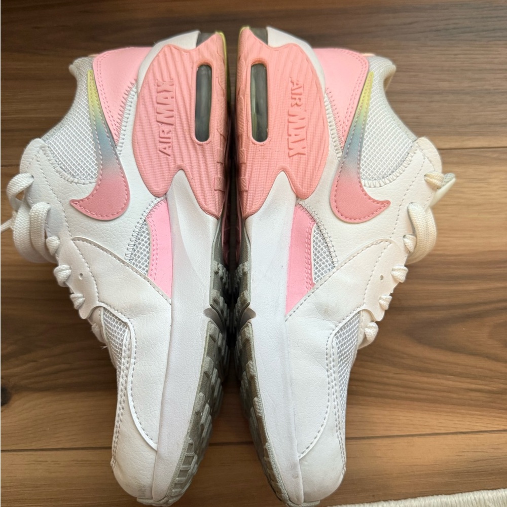 Nike Pink and White Sneakers with Classic Silhouette